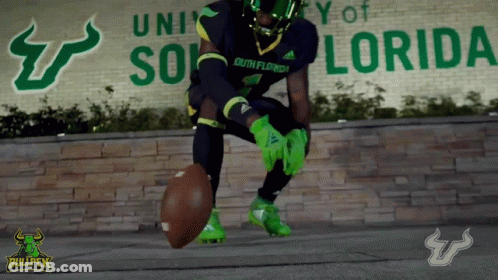 Football Player In Front Of University Of Florida Sign GIF
