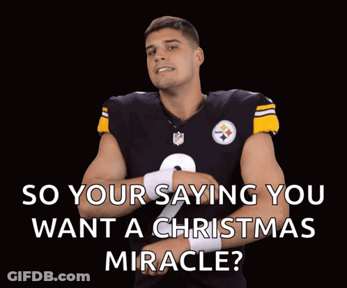 Football Player In Giants Helmet Raising Arm GIF