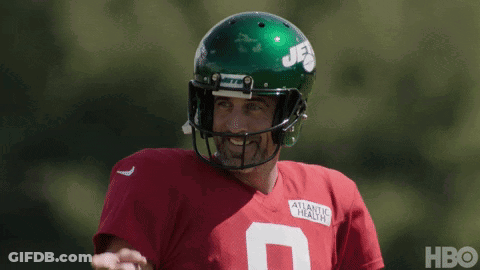 Football Player In Green Helmet And Red Jersey GIF