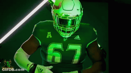 Football Player In Green Jersey Number 67 GIF