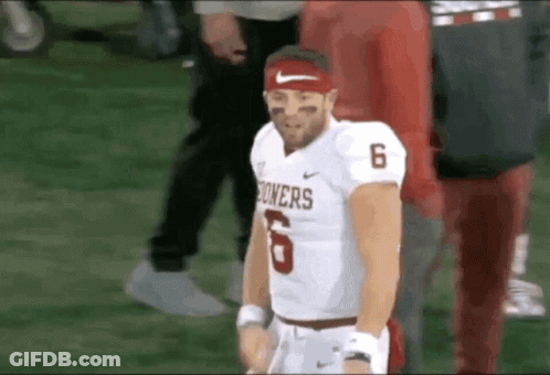 Football Player In Headband And Jersey Number 6 GIF