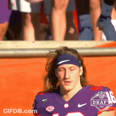Football Player In Headband And Purple Jersey GIF