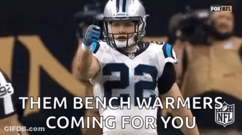 Football Player In Helmet And Gloves On Field GIF