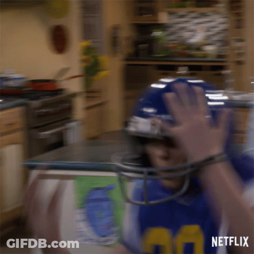 Football Player In Helmet And Jersey 39 GIF