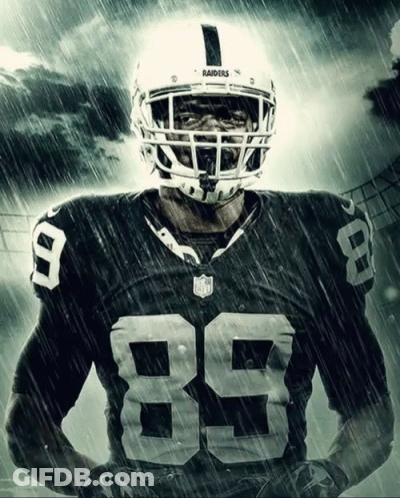 Football Player In Helmet And Jersey Number 85 GIF