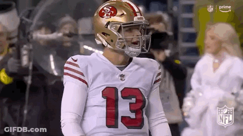 Football Player In Helmet And Number 13 Jersey GIF