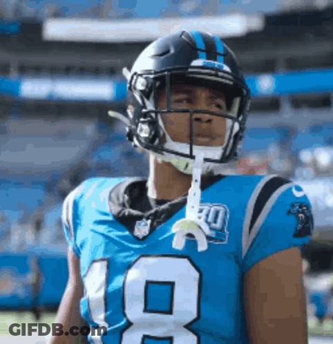 Football Player In Helmet And Number 18 Jersey GIF