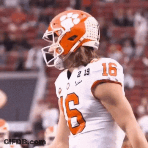 Football Player In Helmet And White Jersey Number 16 GIF
