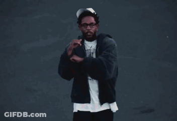 Football Player In Helmet And White Jersey Standing On Field GIF