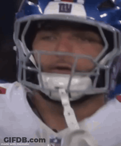 Football Player In Helmet And White Shirt GIF