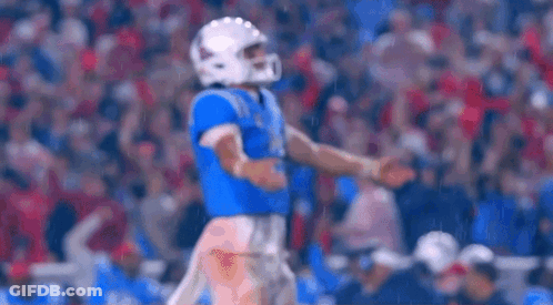 Football Player In Helmet On Field GIF