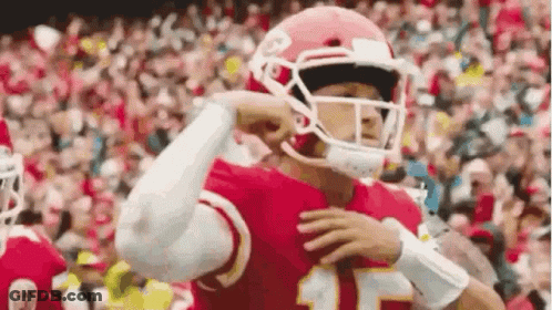 Football Player In Helmet On Field GIF
