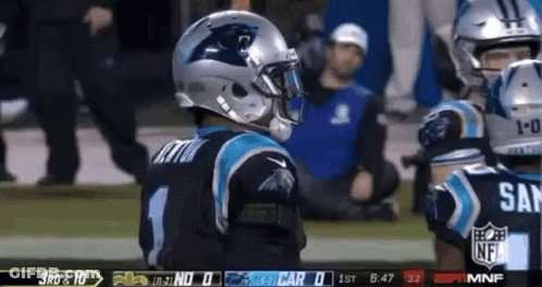 Football Player In Helmet On Field GIF