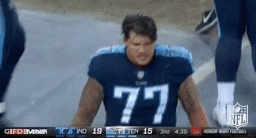 Football Player In Jersey Number 77 GIF