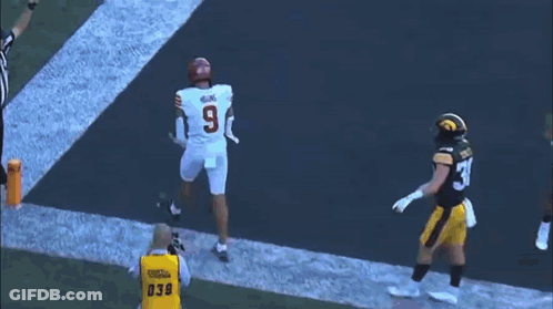 Football Player In Jersey Number 9 On Field GIF