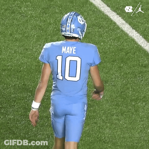 Football Player In Number 10 Jersey Holding Football GIF