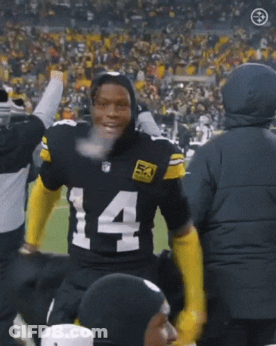 Football Player In Number 14 Jersey In Front Of Crowd GIF