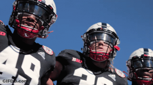 Football Player In Number 19 Jersey Next To Another Player GIF