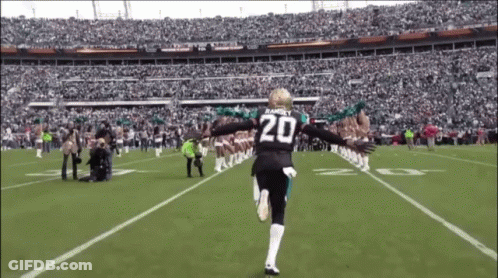 Football Player In Number 20 Jersey Running GIF