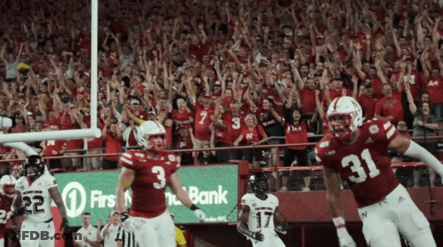 Football Player In Number 3 Jersey In Front Of Crowd GIF