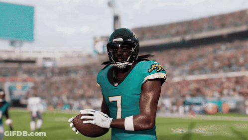 Football Player In Number 7 Jersey Holding Football GIF
