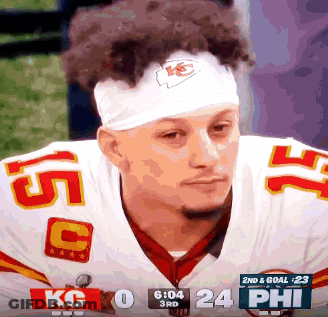Football Player In Number 75 Jersey Next To Another Player GIF