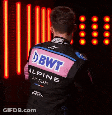Football Player In Number 9 Jersey Holding Helmet GIF