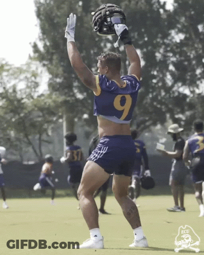Football Player In Number 9 Jersey Holding Helmet GIF