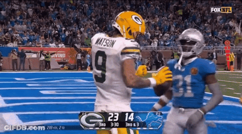 Football Player In Number 9 Jersey Talking To Another Player GIF