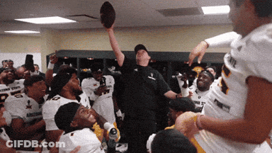 Football Player In Oklahoma State Jersey Making Heart Hands GIF