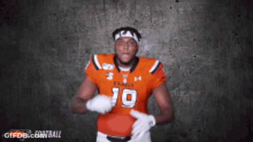 Football Player In Orange Jersey Number 19 GIF