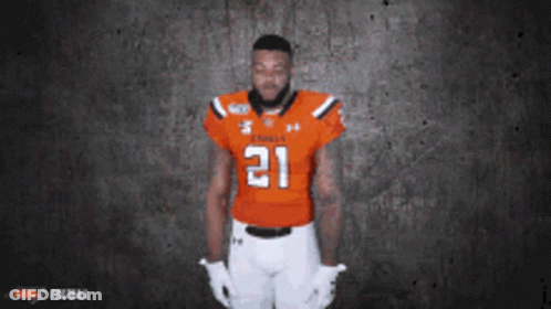 Football Player In Orange Jersey Number 21 GIF