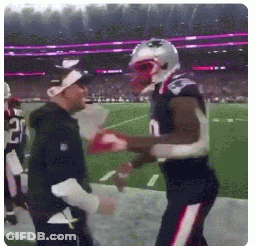 Football Player In Patriots Helmet Shaking Hands With Coach GIF