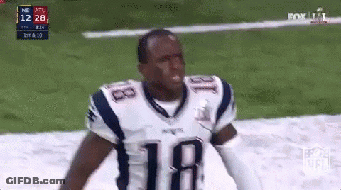 Football Player In Patriots Jersey Standing On Field GIF
