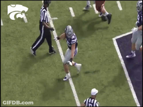 Football Player In Purple Jersey Number 56 GIF