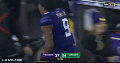 Football Player In Purple Jersey Number 9 GIF