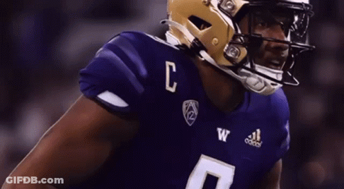 Football Player In Purple Jersey With Letter C GIF