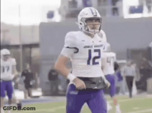 Football Player In Purple Uniform Number 10 GIF
