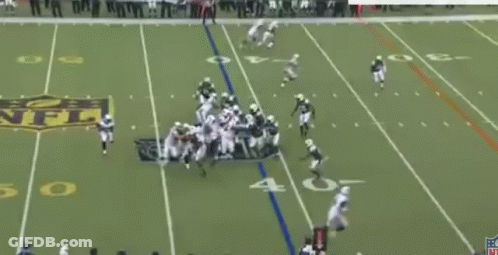 Football Player In Purple Uniform Number 18 GIF