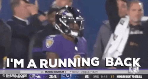 Football Player In Purple Uniform Running Back GIF