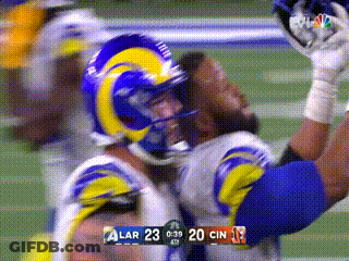 Football Player In Rams Helmet Catching Ball GIF