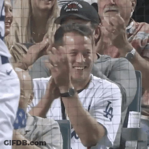 Football Player In Rams Helmet Kneeling On Field GIF