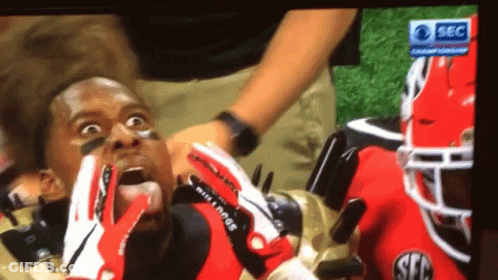 Football Player In Red And White Gloves With SEC GIF