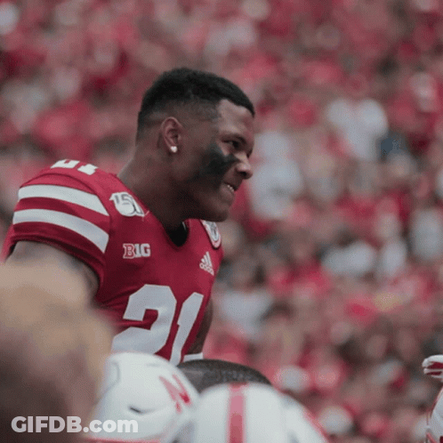 Football Player In Red And White Jersey Number 21 GIF