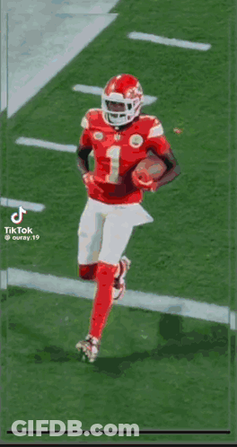 Football Player In Red Dancing On Field GIF