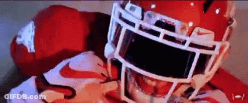 Football Player In Red Helmet Close Up GIF