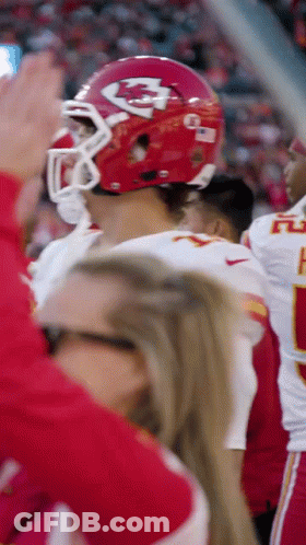 Football Player In Red Helmet With Letter K In Front Of Crowd GIF