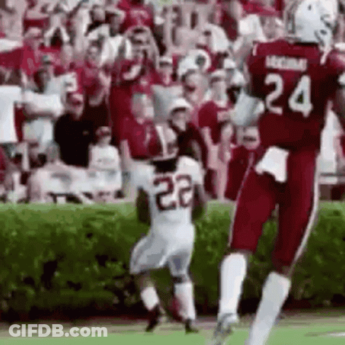 Football Player In Red Jersey 24 Catching Ball GIF