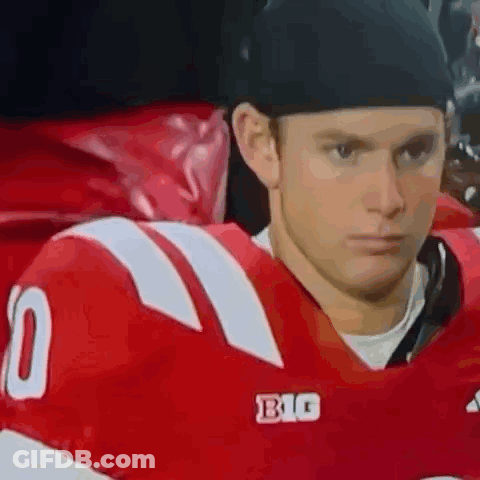 Football Player In Red Jersey And Black Headband GIF