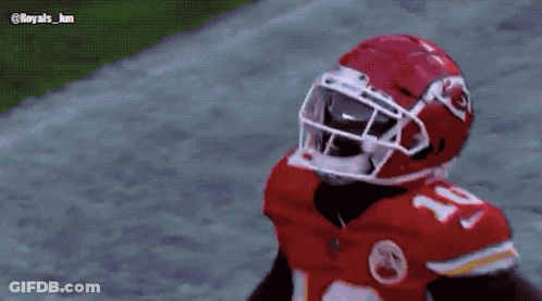 Football Player In Red Jersey And Helmet Number 17 GIF